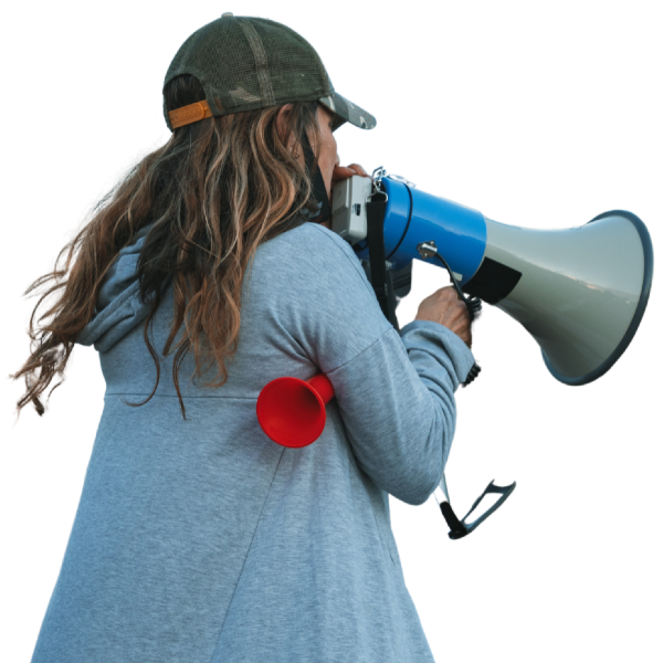 A woman with a megaphone at a campaign rally