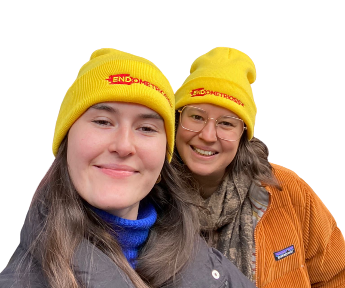 two women wearing Endometriosis UK hats