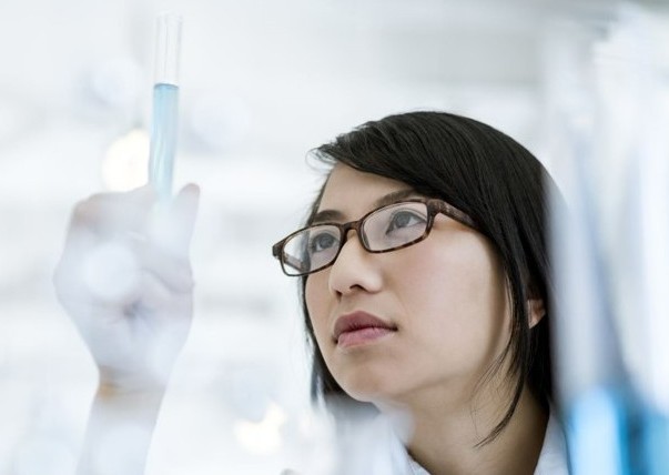 Scientist holding a pipette
