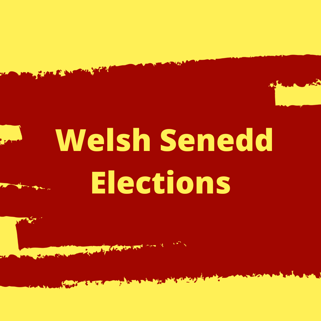 Graphic with a pale yellow background and broad red paint-stroke bands across the centre. Large yellow text reads: “Welsh Senedd Elections”