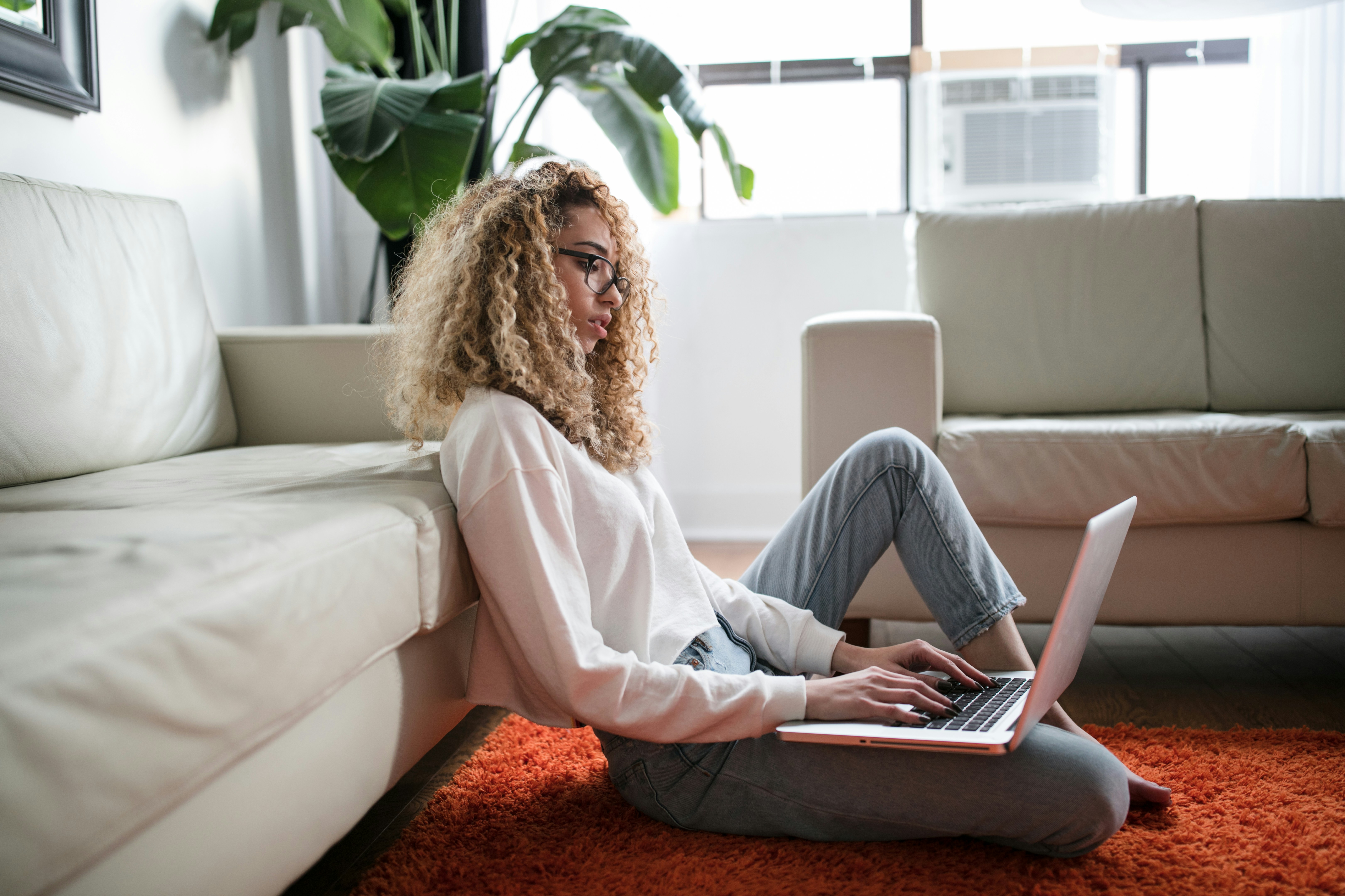 Woman using laptop at home