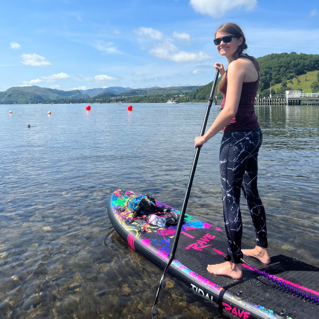 A photo of Leanne on a paddle board 