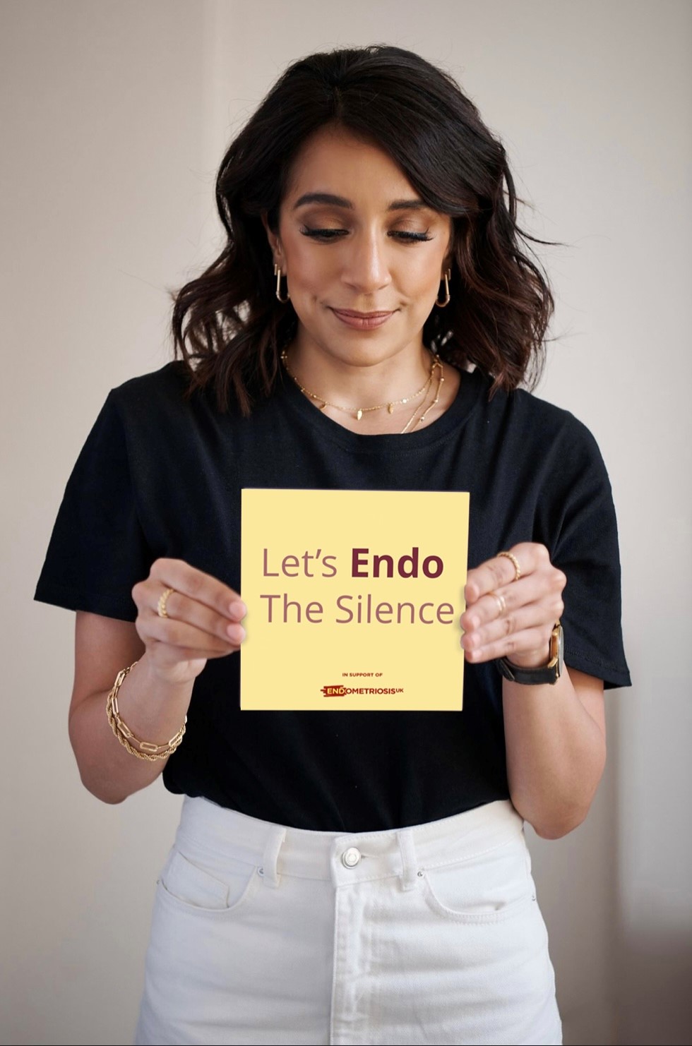 Aneka with a sign saying "Lets Endo the Silence"