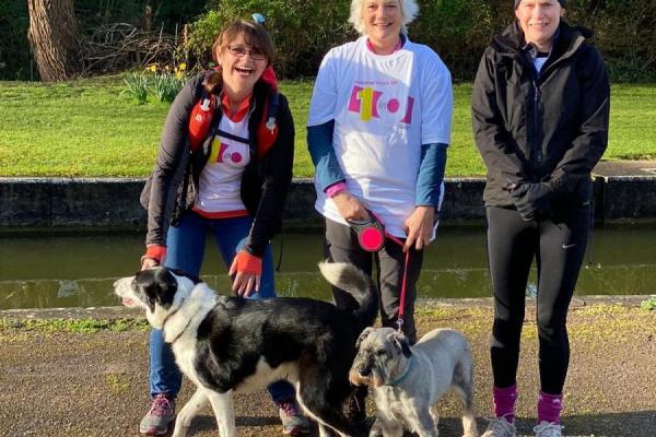 June with two friends and two dogs ready for a walk