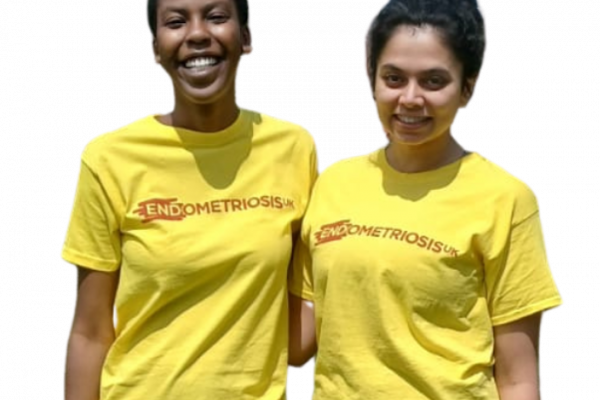 Two women in Endometriosis UK tshirts smiling