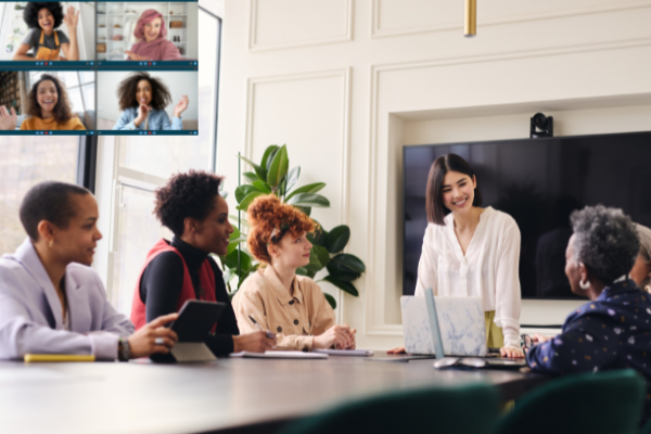 Women in face-to-face and virtual meeting