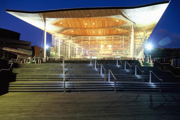 The Senedd Cymru - Welsh Parliament - Building lit up at night